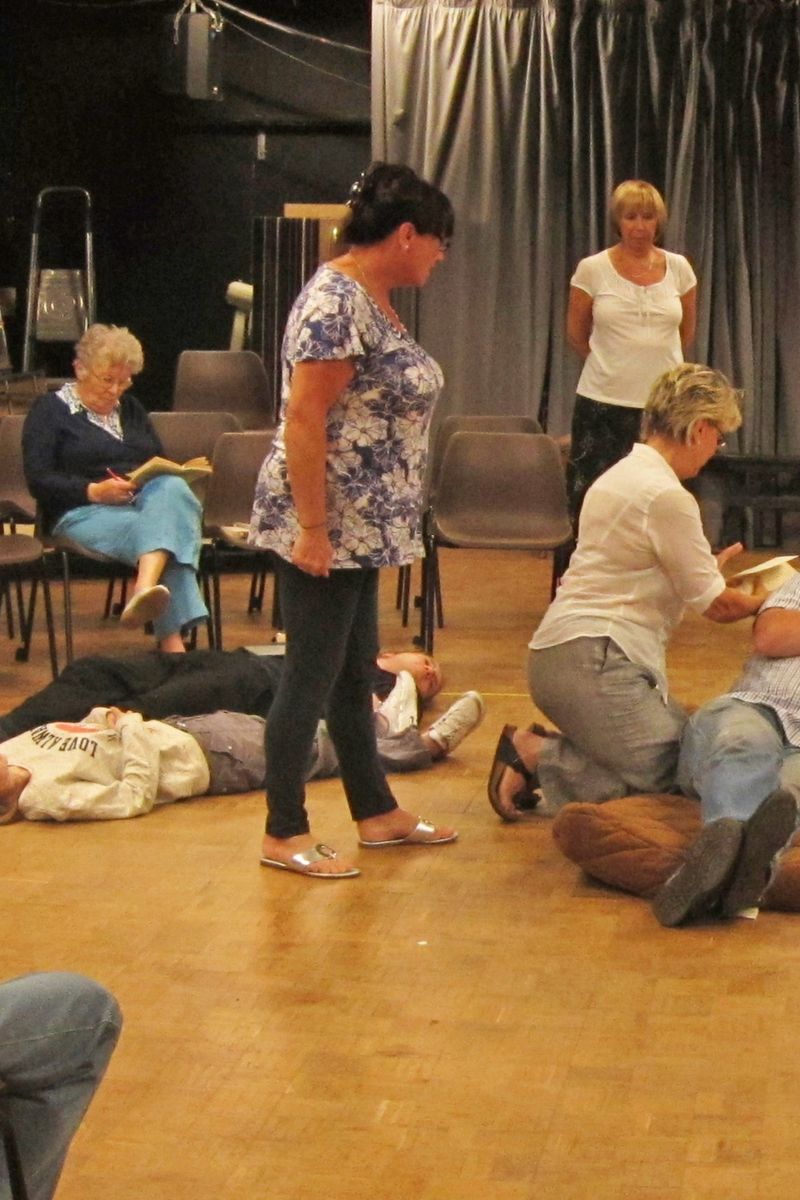 The cast in rehearsal